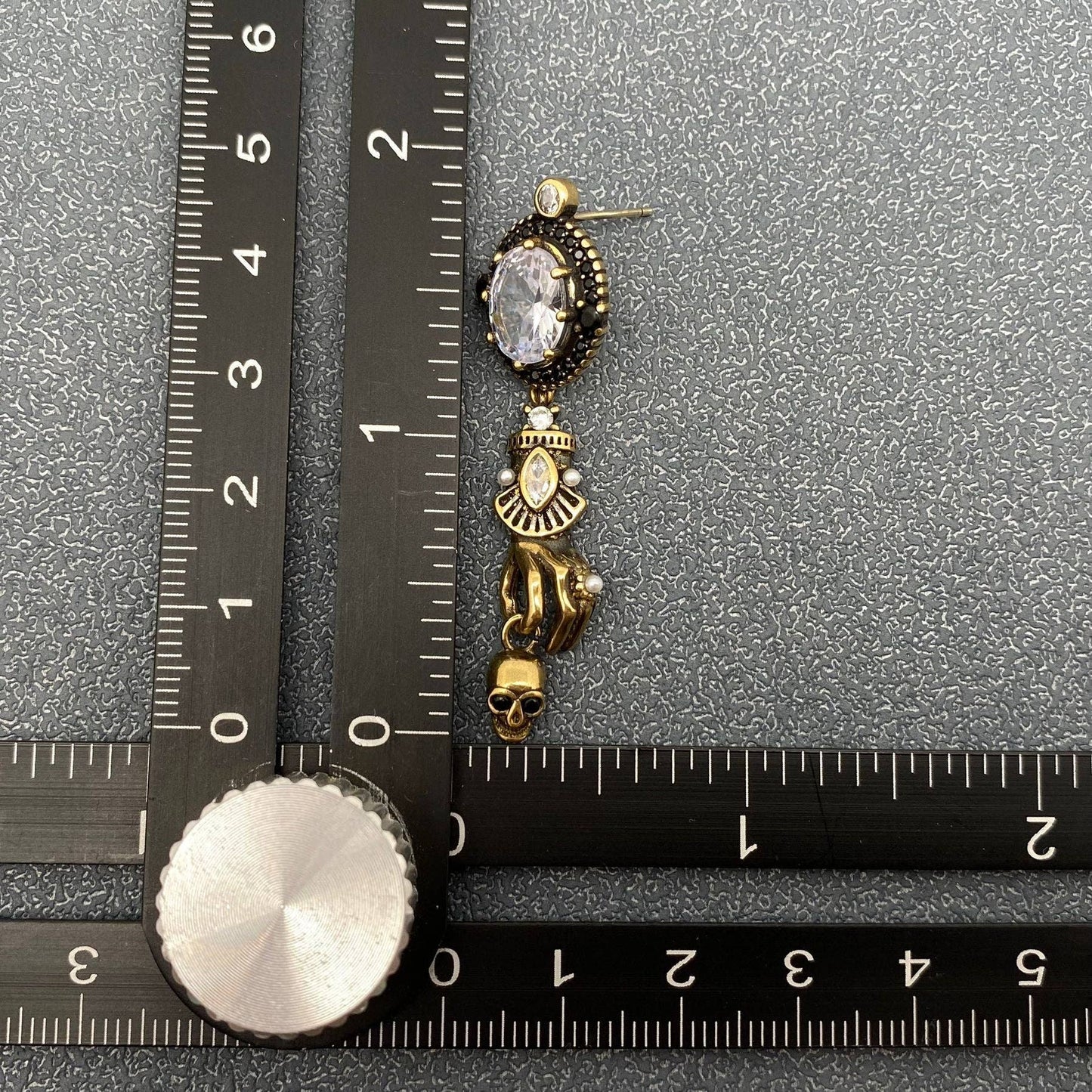 Skull In Hand Vintage Style Post Earrings