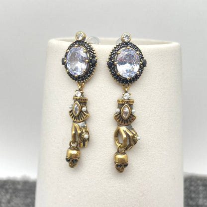 Skull In Hand Vintage Style Post Earrings