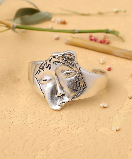 Artisan Silver Cuff Bracelet with Intricate Face Detail