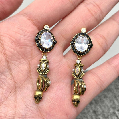 Skull In Hand Vintage Style Post Earrings