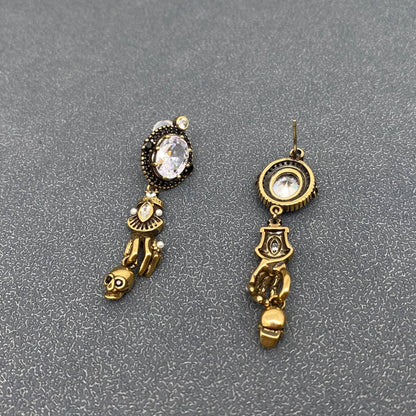 Skull In Hand Vintage Style Post Earrings